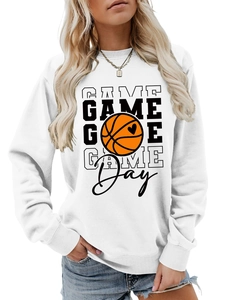 Detailed view of Game Day basketball print on a white long sleeve sweatshirt