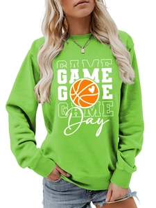 Detail of lime green sweatshirt featuring GAME DAY basketball graphic and ribbed cuffs