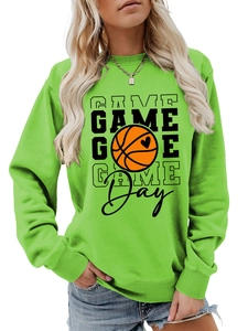 Detail of ribbed knit cuffs and hem on bright green Game Day basketball sweatshirt