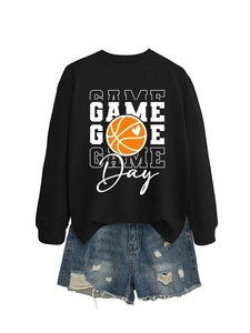 Detail of black Game Day sweatshirt with basketball heart paired with distressed denim shorts
