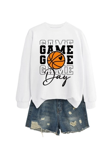 Detail of white long sleeve sweatshirt with heart basketball print and ripped denim shorts