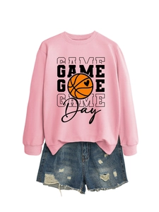 Flat lay of pink Game Day sweatshirt with basketball heart and distressed denim shorts