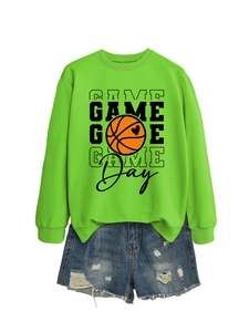 Detail of neon green Game Day sweatshirt with basketball heart print and ripped denim shorts