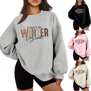 Detail view of oversized sweatshirts with 'I don't do WINTER' print in four colors