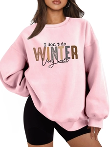 Close-up of pink casual sweatshirt with 'I don't do WINTER Very well' graphic print