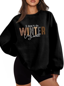 Detail of oversized black sweatshirt with I Don't Do Winter colorful letter print