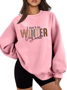 Detail of pink fleece sweatshirt with colorful I Don't Do Winter Very Well slogan print