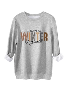 Detail view of grey fleece sweatshirt with I don't do winter very well print