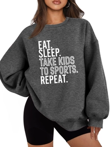Detail of Eat Sleep Take Kids slogan print on loose dark grey cotton blend sweatshirt