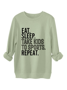 Detail view of sage green sweatshirt with Eat Sleep Take Kids To Sports Repeat print