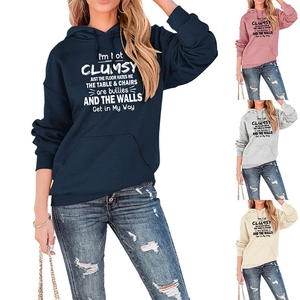 Detail of drawstring hood and pouch pocket on various colored casual hoodies