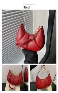 Detailed views of red quilted hobo bag with gold chain strap and smooth PU texture