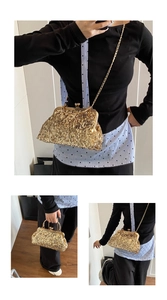 Close-up of golden sequin evening clutch with metal handle and elegant chain strap