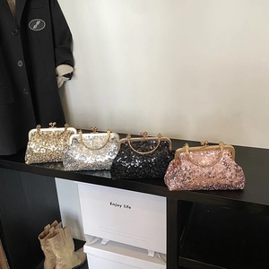 Elegant sequined evening clutch bags in champagne, silver, and black with metal handles