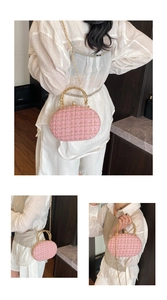 Detail of pink tweed evening bag with gold floral handle and pearl closure clasp