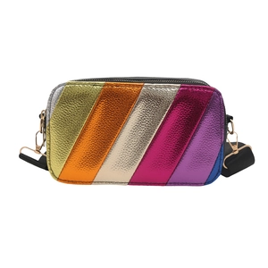 Rainbow striped leather crossbody camera bag with colorful textured metallic panels