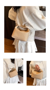 Three-way view of beige woven crossbody bag showing back, side, and hand-carry styles