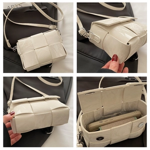Detail view of cream woven crossbody bag with glossy texture and adjustable strap