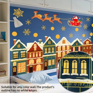 Close-up of Christmas wall stickers showing fine edges and reindeer patterns on a blue wall