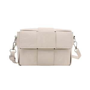 Cream woven crossbody shoulder bag with a modern rectangular design and adjustable strap