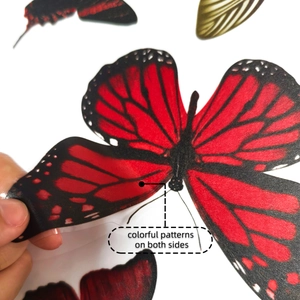 Close-up of red and black butterfly window sticker with double-sided color printing