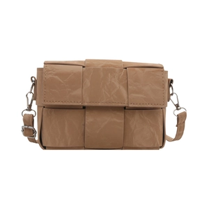 Caramel brown woven crossbody bag with vintage leather texture and wide strap design