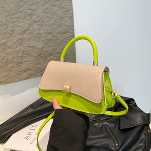 Elegant green and beige patchwork handbag with gold clasp and detachable shoulder strap