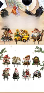 Detailed view of various PVC garden stakes featuring colorful Easter and holiday designs