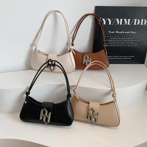 Minimalist small square underarm bags in four colors with large silver geometric buckles