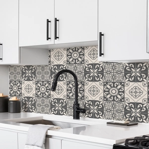 Macro shot of waterproof black and white geometric tile stickers in a modern kitchen