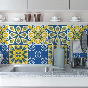 Mediterranean blue and yellow floral tile stickers applied as a kitchen backsplash