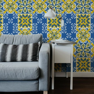 Detailed view of blue and yellow geometric marble pattern tile stickers on living room wall