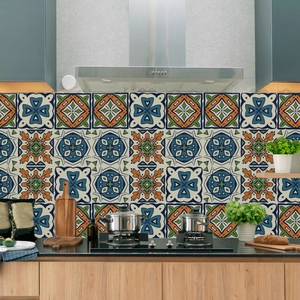 Detailed Moroccan geometric tile stickers on kitchen backsplash with blue and orange patterns