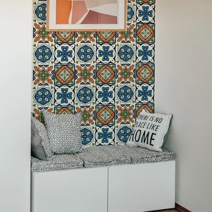 Detail of Mediterranean faux marble tile stickers on a home background wall with retro patterns