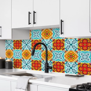 Detail of colorful Bohemian geometric patterned backsplash tile stickers in kitchen setting