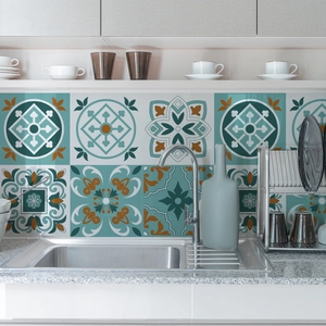 Detail of self-adhesive retro mandala tile stickers on a kitchen backsplash wall