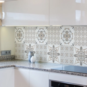 Detailed view of grey and beige mandala pattern self-adhesive wall tiles in modern kitchen