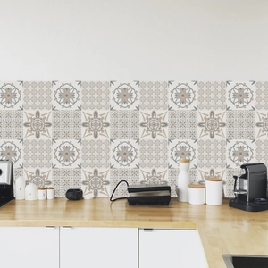Macro detail of mandala pattern tile stickers in a modern kitchen backsplash setting