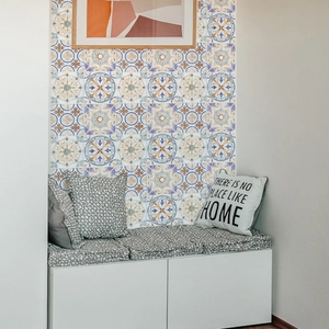 Mediterranean retro mandala tile stickers applied in a home hallway with blue-orange patterns