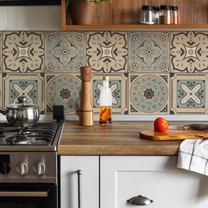 Detail of vintage marble pattern backsplash tiles in a modern kitchen setting