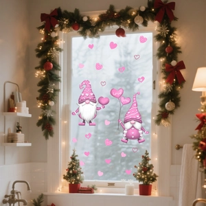 Close-up of pink Christmas gnome window stickers with hearts and love you balloon decor
