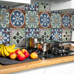 Retro geometric marble pattern wall stickers used as a kitchen backsplash behind a stove