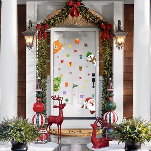 Festive Christmas static decals featuring Santa and reindeer on a white home door
