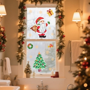 Detail of Christmas window stickers with Santa and tree motifs in a cozy home setting