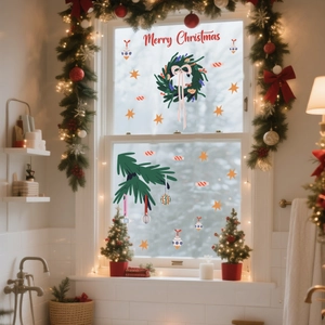 Detail showing Merry Christmas lettering and hand-drawn wreath stickers on a window