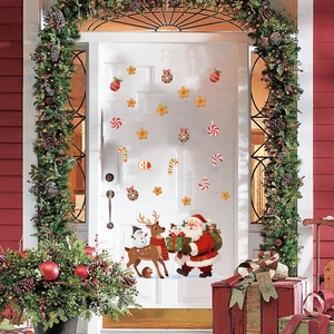 Christmas window stickers set with Santa and reindeer on a white wooden door decor