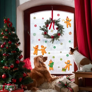 Cozy Christmas window decals featuring gingerbread men and colorful candy decorations