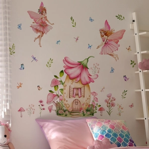 Détail de stickers fées avec maisons roses et fleurs pour chambre de petite fille
