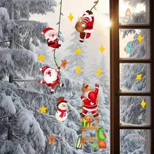Detail view of Santa Claus and snowman static window stickers on a glass surface