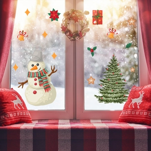 Detail of Christmas window stickers featuring snowman and festive holiday decorations